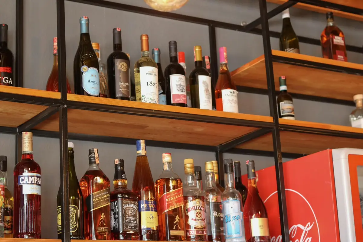 Our bar shelves stocked with wines and spirits